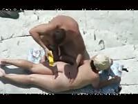 Horny couple on the beach