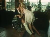 Blonde sucks a guy in a chair