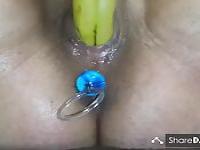 Amateur beads milf squirting fucking a banana with